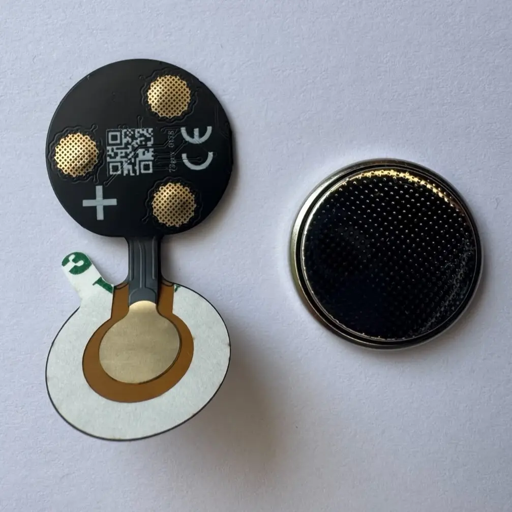 Pile CR2025 et circuit Blockey avant assemblage